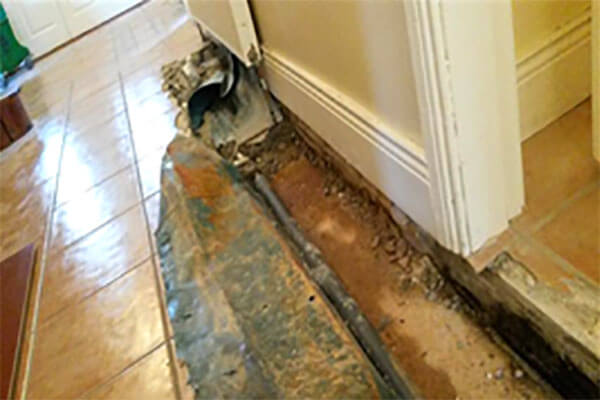 Home hallway damaged by water leak.